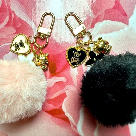 Other - NWT-PINK / BLACK POM BAG CHARMS